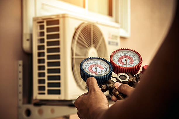 Professional Ac Installation technician working in Center Cross, VA